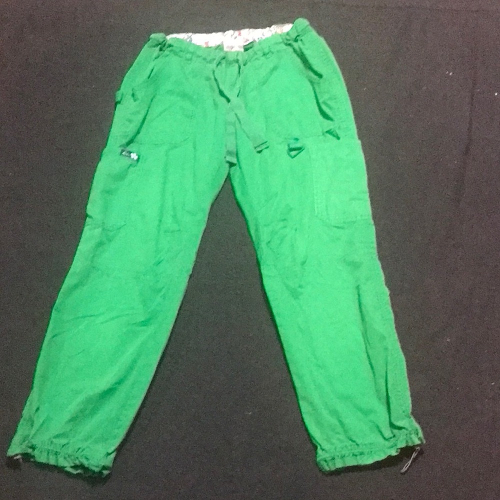 Koi scrubs bright green